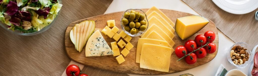 Photo Of Cheese On Wooden Tray